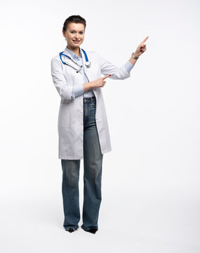 Medical doctor woman presenting and showing copy space for product or text