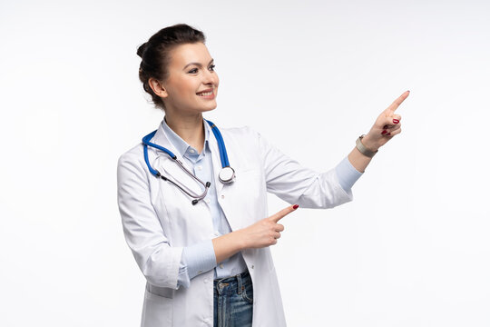 Medical doctor woman presenting and showing copy space for product or text