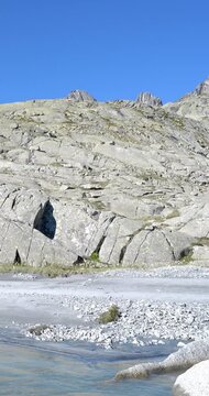 A Dolomite stream among the stone giants 