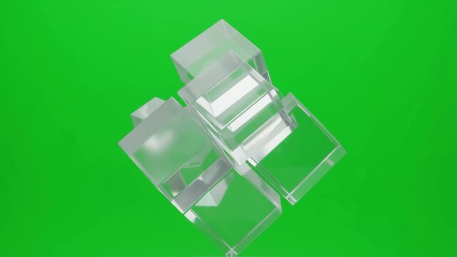 Interlocking frosted glass cubes rotating on green screen background