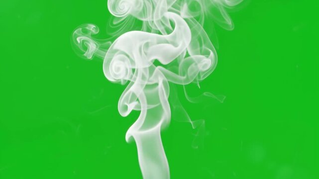 White smoke plume rising and billowing on chroma key green screen