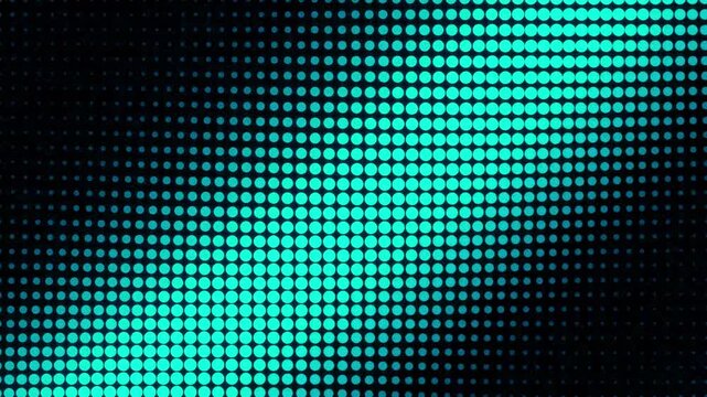 Abstract cyan halftone dot pattern on black background