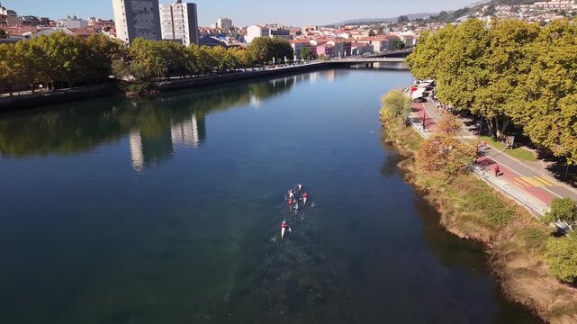 Aerial drone shot showing the city of pontevedra, the l&eacute;rez river, and the tirantes bridge in galicia