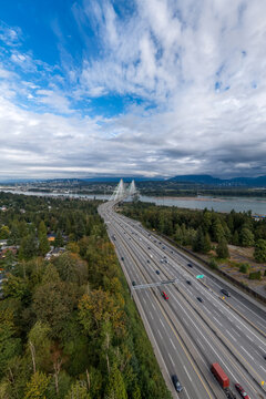 Aerial View of Highway 1 and Cable-Stayed Bridge Over the Fraser River Near Surrey, Vancouver, BC, Canada