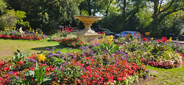 Colorful Flower Beds and Ornamental Fountain at Royal Crescent Bath England