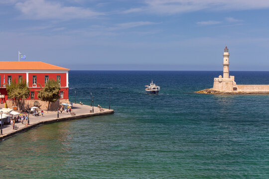 Chania Old Venetian Harbor and Lighthouse in Crete, Greece