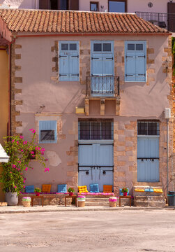 Traditional House Facade with Blue Shutters in Chania, Crete, Greece