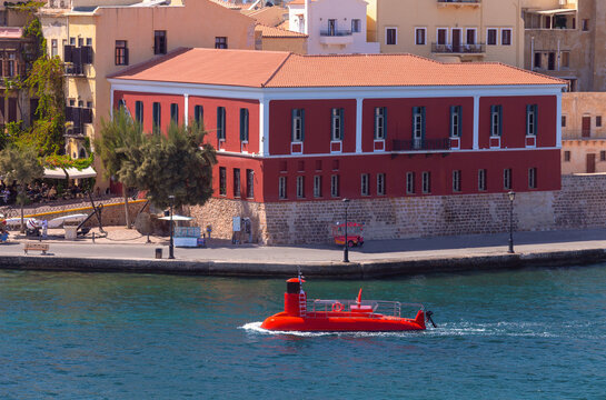 Red Tourist Boat in Chania Old Venetian Harbor, Crete, Greece