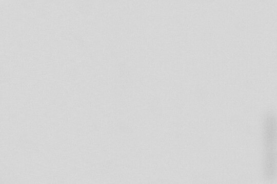 Fine 35mm ISO 50 film grain texture with subtle light noise on a white background for clean cinematic overlays and design.