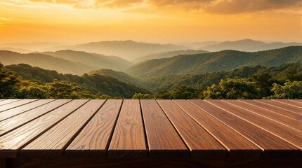 Obraz premium Empty wooden deck table with brown texture in foreground. View of green mountain range, forest under golden sunset sky. Scenic landscape with misty hills. Mockup surface for product display in nature