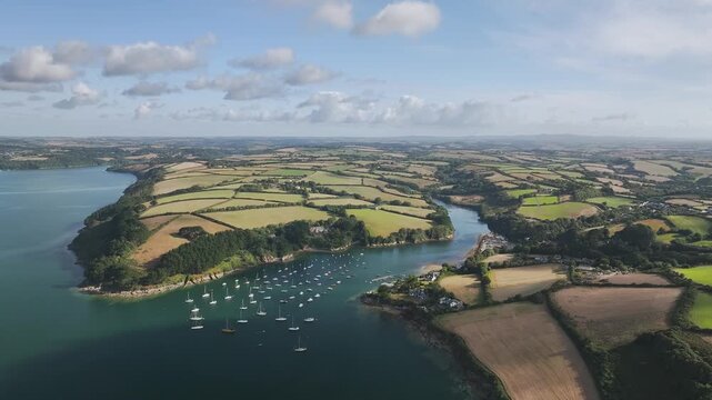 Farms and Fields over St Mawes from drone, Carrick Roads, River Fal, Falmouth, Cornwall, UK
