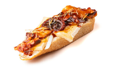 Close-up of a seafood bruschetta with octopus tentacle and Brie cheese, isolated on a transparent background. © mario