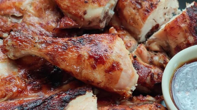 Grilled chicken on plate with sauce