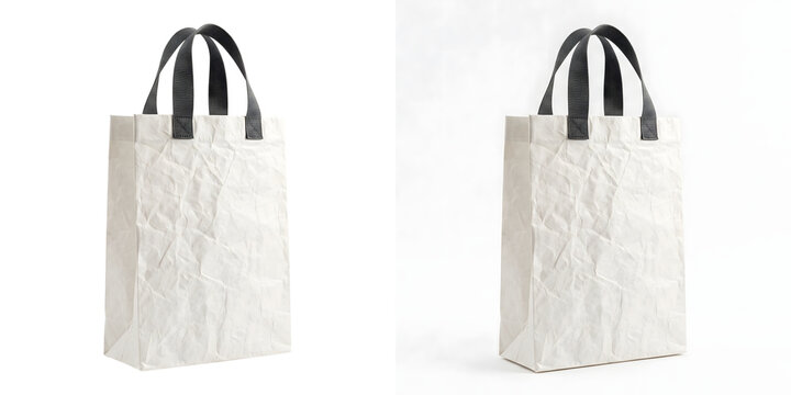Tote bag mockup in blank white crinkled Tyvek paper with black webbing handles and a tall shape for reusable shopping and modern eco branding