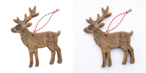 Rustic wooden reindeer ornament with a distressed finish and red and white striped hanging cord shown as an isolated PNG transparent background © Graphen