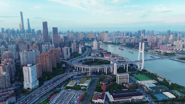 Aerial View of Shanghai Skyline and Nanpu Bridge Interchange at Dusk in Shanghai, China