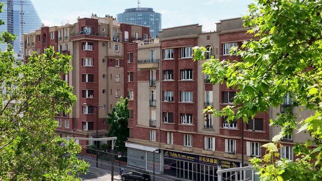 Red Brick Residential Apartment Buildings Framed by Lush Green Trees