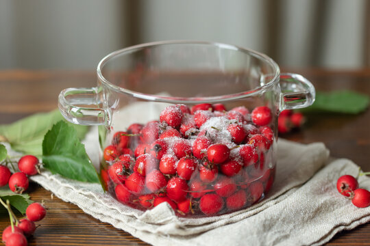Process of making hawthorn berry jam. Autumn lifestyle concept