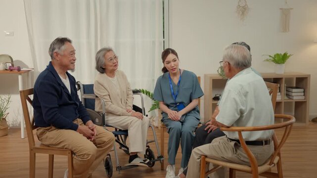 Senior group sharing elderly social interaction in warm cozy room with caregiver support, calm conversation, chairs, and supportive community care