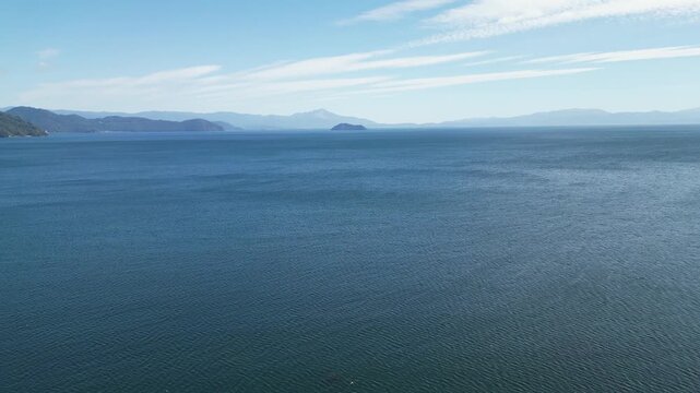 Drone Aerial View Over Lake Biwa with Mountains in Takashima, Shiga, Japan 003