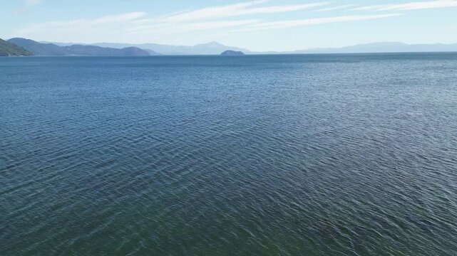 Drone Aerial View Over Lake Biwa with Mountains in Takashima, Shiga, Japan 001
