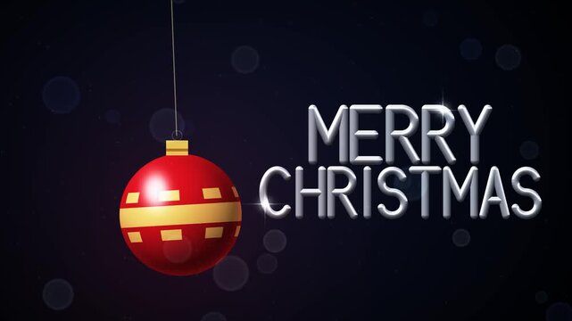 Shiny red Christmas bauble with a gold pattern rotating and swinging on a string beside chrome silver Merry Christmas text