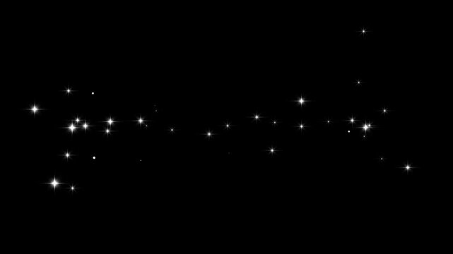 Elegant white star sparkle explosion with shimmering dust, magical glitter trail and twinkling fairy effects for elegant festive overlays on black screen background in 4k