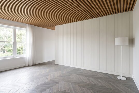 Minimalist contemporary empty room with herringbone wood flooring and wooden ceiling