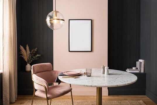 Contemporary minimalist dining room with marble table and pink accent wall