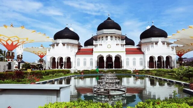 Front view of the Baiturrahman Grand Mosque (Masjid Raya Baiturrahman) in Banda Aceh, Indonesia