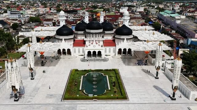 Front view of the Baiturrahman Grand Mosque (Masjid Raya Baiturrahman) in Banda Aceh, Indonesia