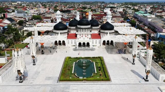 Front view of the Baiturrahman Grand Mosque (Masjid Raya Baiturrahman) in Banda Aceh, Indonesia