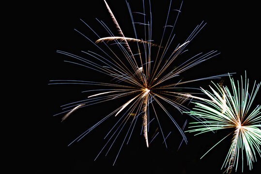 Fireworks lighting up the night sky. Pyrotechnics, abstract	