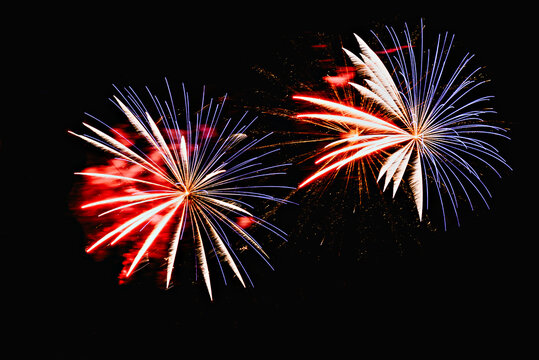 Fireworks lighting up the night sky. Pyrotechnics, abstract	