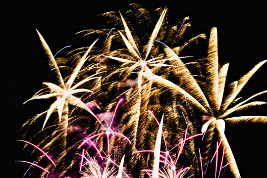 Fireworks lighting up the night sky. Pyrotechnics, abstract	