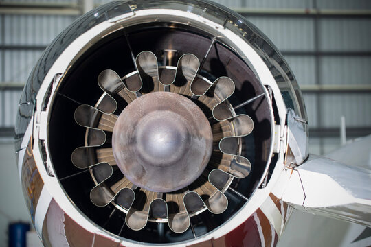  Jet engine intake and fan blades at an airport.