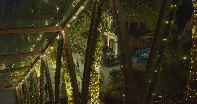 elevator pov Illuminated Garden Staircase Among Tropical Palms in Sunset Town, Phu Quoc