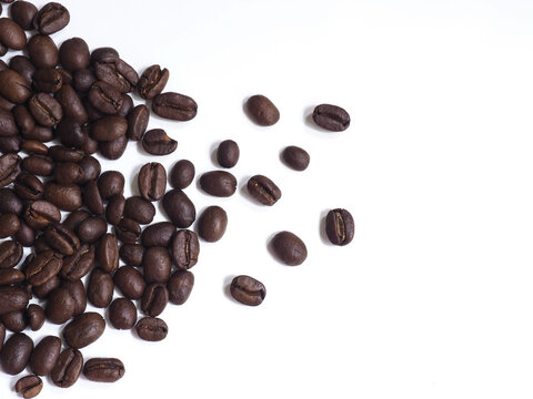 Scattered Roasted Coffee Beans Frame with Copy Space on White