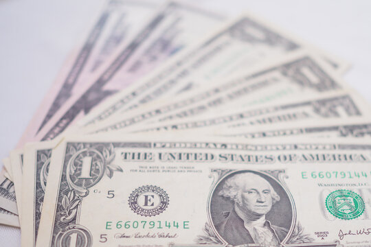 USD currency , close up of dollar bank on hands. The  Dollar is the currency of USA that is used to change, buy, sell, accumulate, and invest in united kingdom's state people.