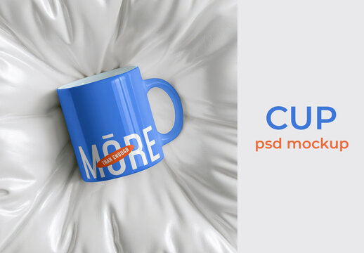Blue Cup PSD Mockup On Soft White Satin Background