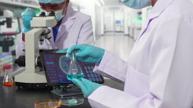 Medical test vaccine research and development concept. Scientist in laboratory study and analyze scientific sample of antibody.