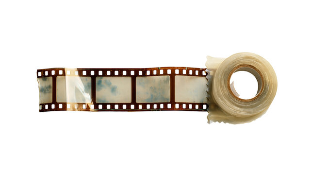 Rolled strip of vintage 35mm photographic film with sprocket holes