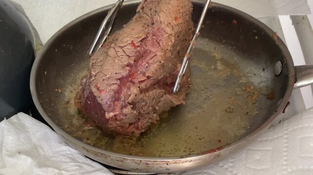 Searing a nice Tri-tip on all sides before finishing it off in the oven. This will seal in the moisture and help the cooking result in a golden crusted outside. Next batch has the carving process.