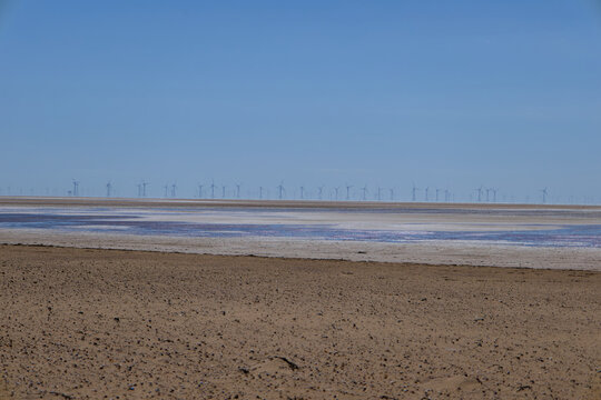 Offshore wind turbines beyond exposed tidal sandflats