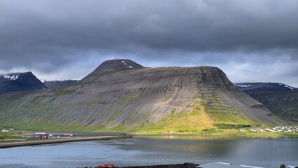 The hills at the harbour somewhere in Norway fjords, Isafjordur. © Mariya