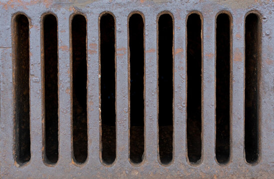 Street drain on road, rainwater drainage