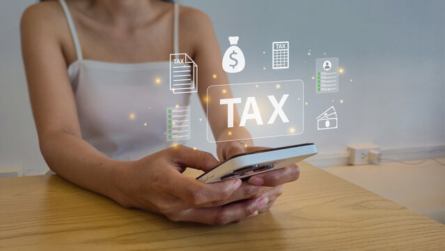 Digital tax filing concept with smartphone and holographic finance icons for modern financial technology templates