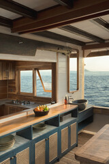 Luxury interior cabin of traditional wooden phinisi boat with ocean view © Fahmi