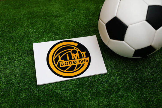 A football on the grass and the Glimt , Bodo Football Club logo. September 30, 2026.