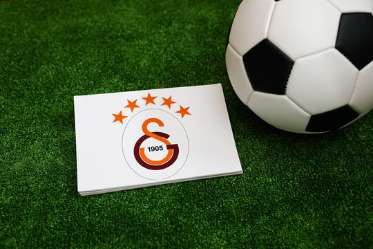 A football on the grass and the Galatasaray Football Club logo. September 30, 2026.